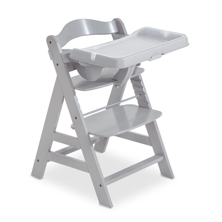 High chair sliding tray outlet